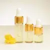 Drie flesjes etherische Ylang Ylang olie van 2 ml, 3 ml, en 4 ml